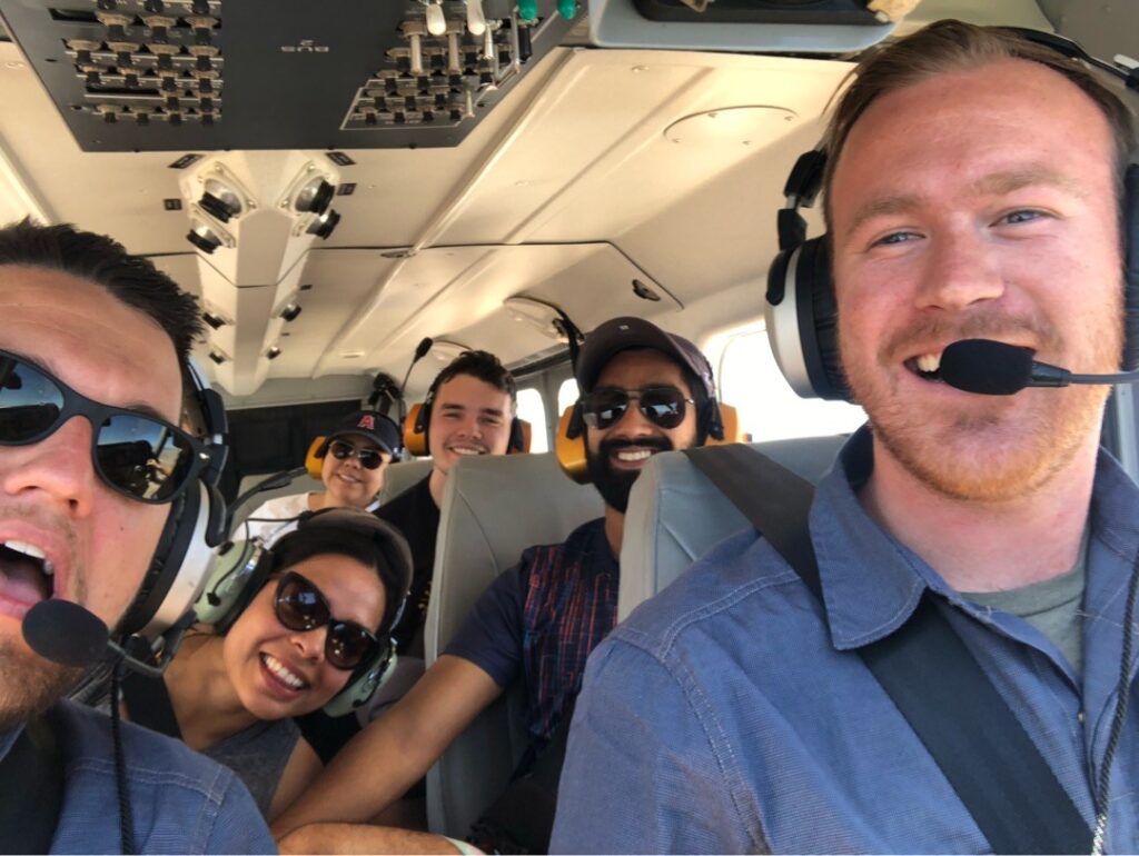Happy people flying in an air plane