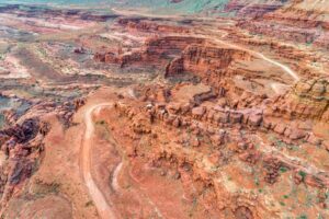 aerial view of Hurrah Pass trail winding through red rock desert