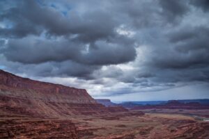 dramatic cliffs and clouds along Hurrah Pass trail near Moab