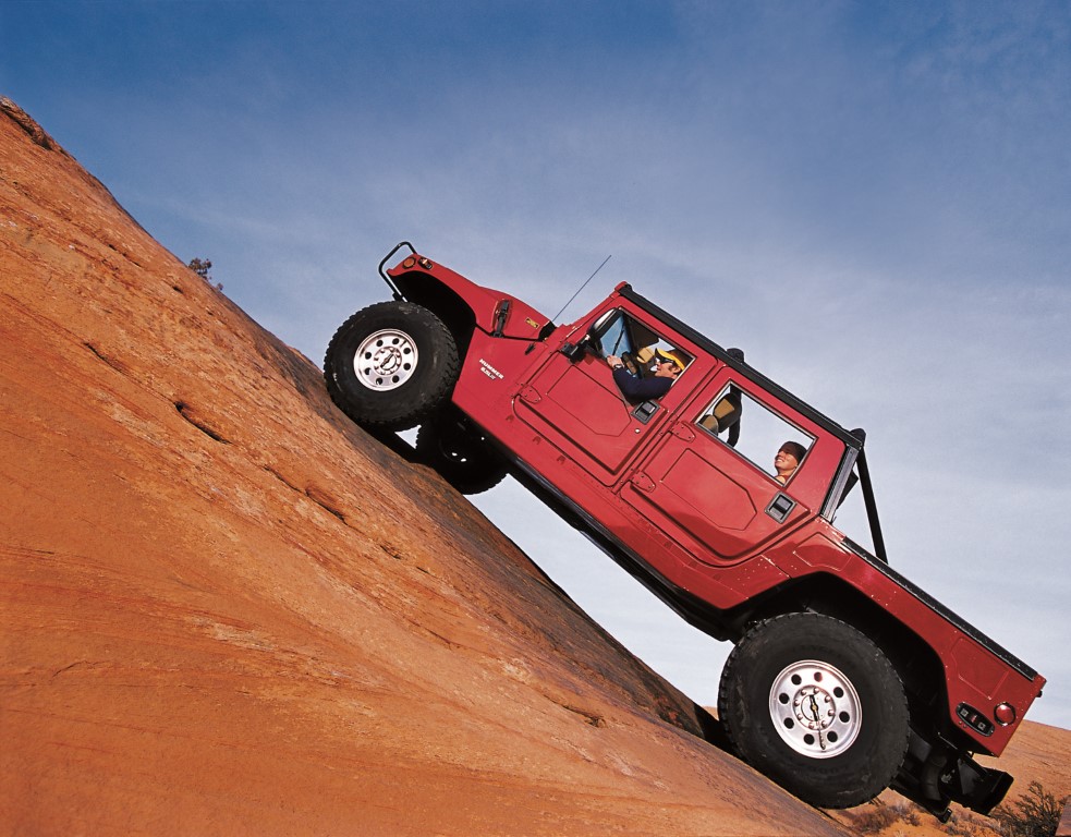 Hummer preparing to climb steep petrified sand dune near Moab
